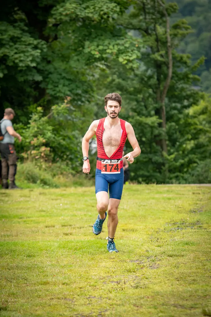 A Beastie competitor running through Balloch Castle Country Park